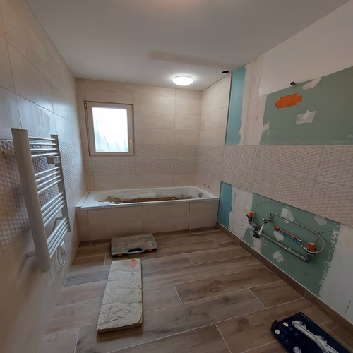 Réalisation 4 rénovation d'une salle de bain et création d'un couloir d'accès garage - Limoges